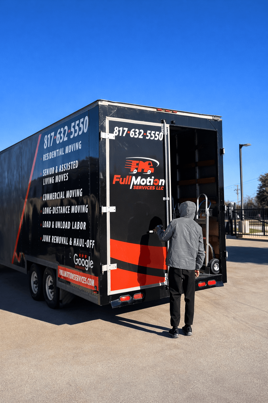 A Full Motion crew loading a truck