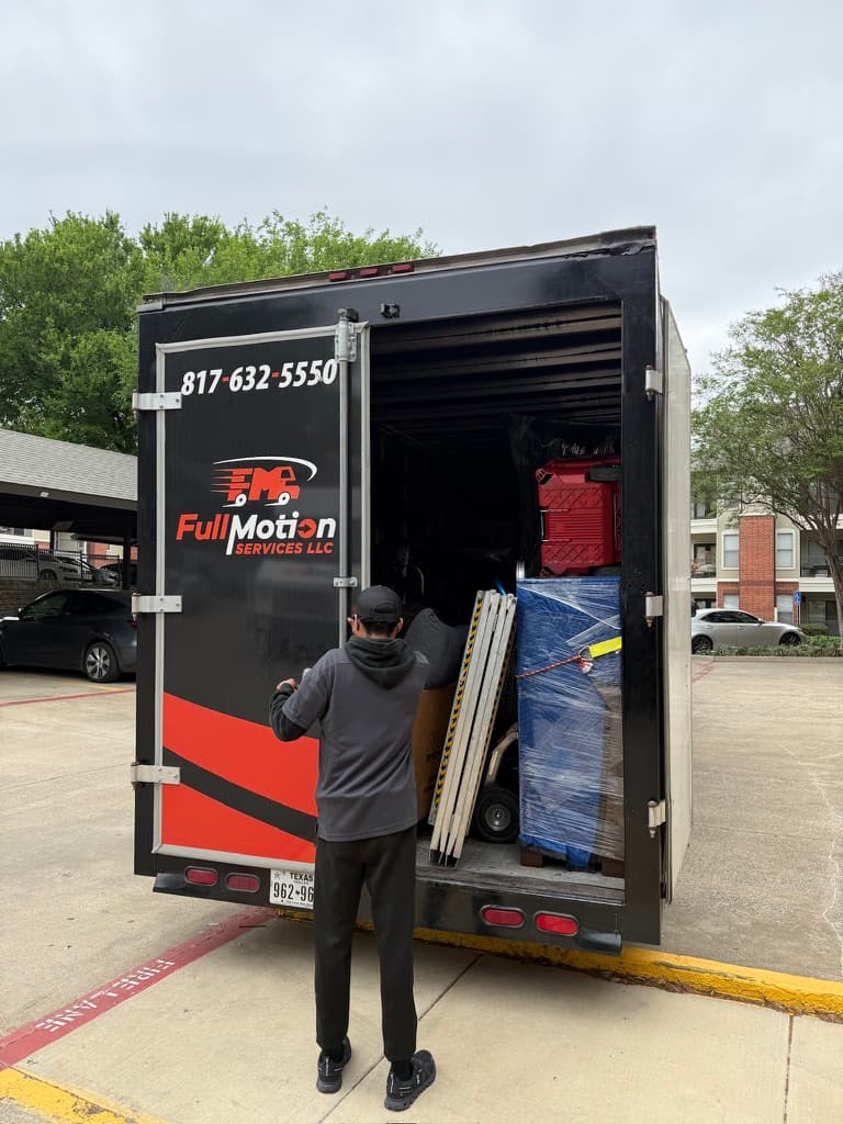 Crew loading the truck at an apartment complex